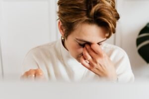 Woman experiencing brain fog after a poor night's sleep